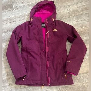 The North Face maroon/pink women’s size small lined ski jacket.